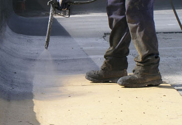 Coating systems over Midland spray foam roof systems